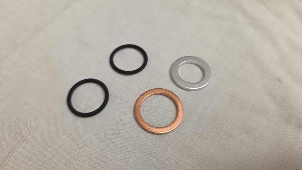 McLaren oil filter nitrile rubber O-rings and crush washers close up